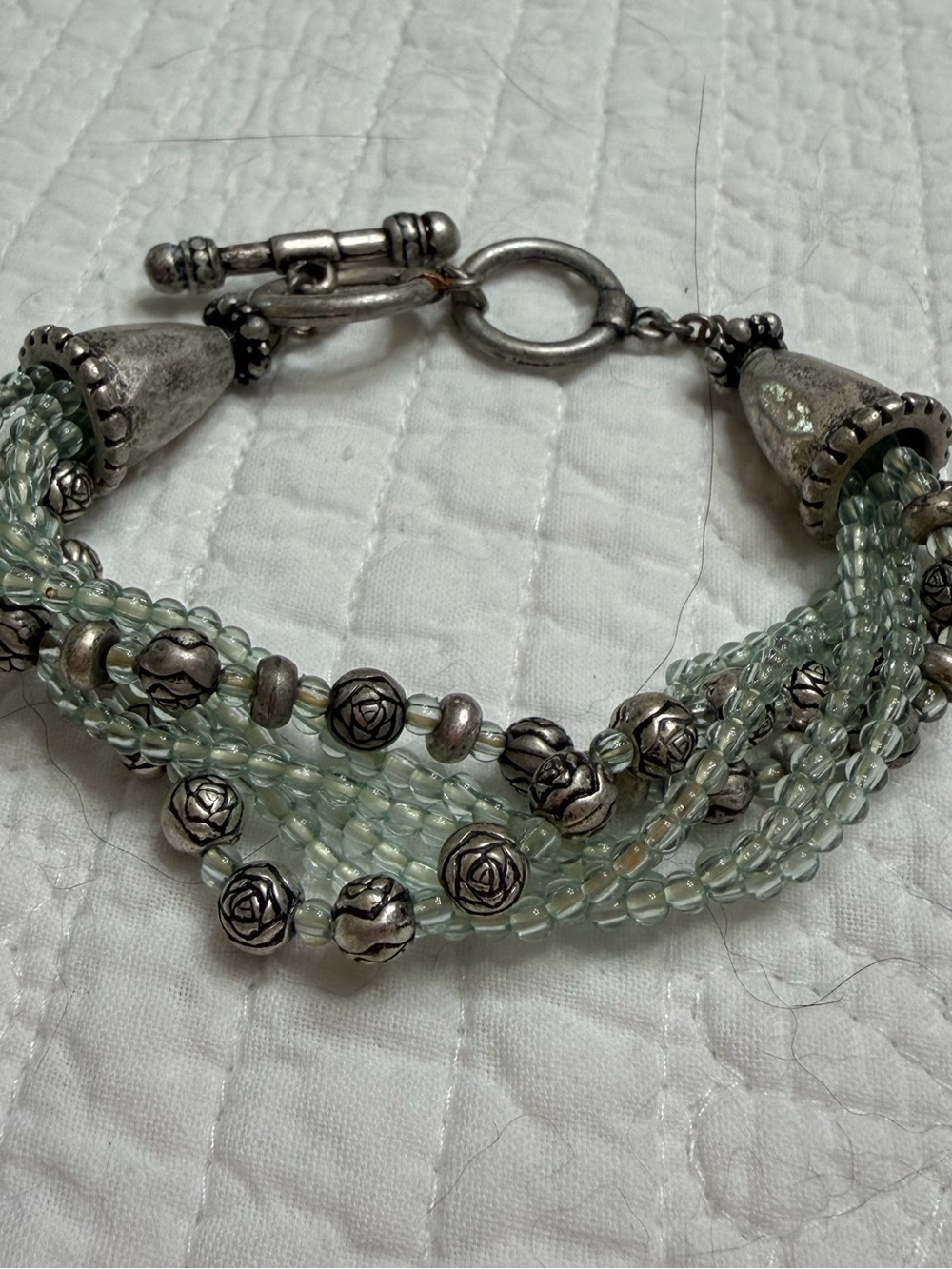 Multi-Strand Pale Green Beaded Bracelet with Silver Accents